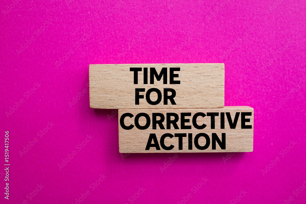 Poster Time for corrective action message written on wooden blocks on pink background. Conceptual time for corrective action symbol. Copy space.