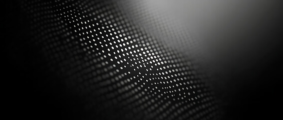 Black and white dots on the left side of an empty background, seamless pattern. Abstract halftone vector illustration with a gradient from light to dark gray