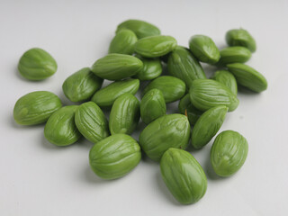 Fresh stinky beans on white background