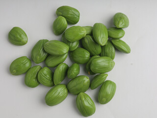 Fresh stinky beans on white background