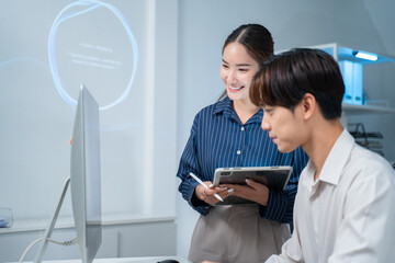 Asian software engineer or programmer team working late in development office,problem solving or algorithm of ai assistant helping for work.software developer,digital technology security concept