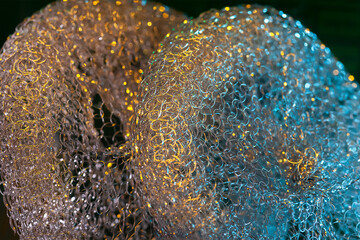 Abstract texture. Colorful metallic macro abstract. Shiny twisted metal wire