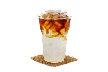 Ice Americano coffee mix coconut milk sliced served on sack in white background.