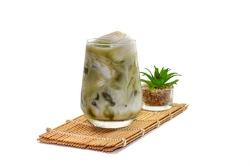 Ice matcha green tea put on wooden plate on white background and concept isolation.