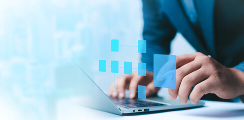 Businessman is showing  process flowchart and workflow automation Document management system automation with flowchart, businessman in background
