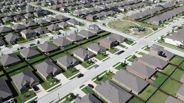 Community playground in master planned development area, fast growing urban expansion Dallas Fort Worth metroplex in Princeton, Texas, new construction homes with young trees immature landscaping