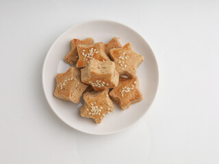 Peanut cookies with star shaped on white background