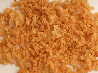 Heap of crispy flakes on white background
