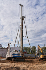 Obraz premium machine for drilling holes for bored piles at construction site