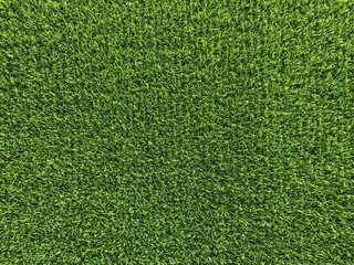 Fototapeta premium Vibrant Green Artificial Grass Texture Background
