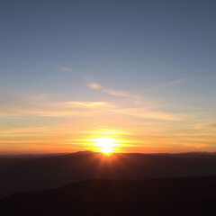 Fototapeta premium Serene Sunset Over Majestic Mountain A Moment Reflection Peace