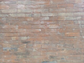 Textured Red Brick Wall with Natural Variations