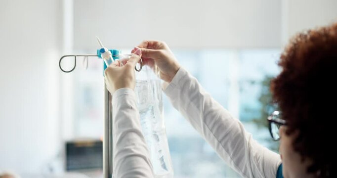 Nurse, hands or prepare iv drip in hospital for patient medication, illness treatment or nutrients. Liquid, woman and monitor intravenous infusion for hydration, anesthesia and prescription medicine