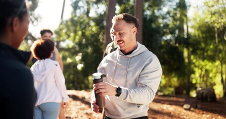 Man, fitness and stretching in forest with water for workout preparation, exercise or outdoor run. Active, male person or runner in group warm up or getting ready with smile for hydration in nature