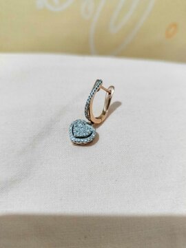 Diamond earring on the table