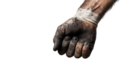 A clenched fist of a person with dirty, scratched skin, symbolizing struggle, resilience, and determination against adversity.