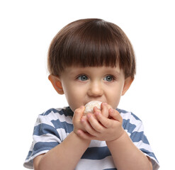 Cute little child eating tasty mochi on white background