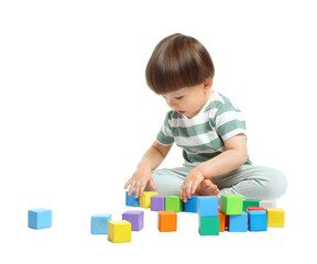 Cute little child playing with colorful cubes on white background