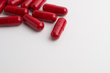 Pills close-up on a color background. Taking vitamins or medications. Concept of healthcare, medicine, pharmacy, disease prevention  