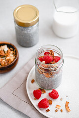 Chia seed porridge with nuts and raspberries