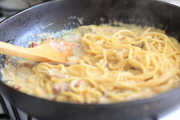 Creamy chicken mushroom spaghetti pasta in close-up