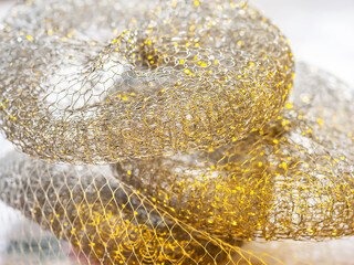 Abstract texture. Coloured metallic abstract. Twisted metal wire. Selective focus