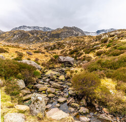 A view up a stream flowing from Lake Idwal in Snowdonia, Wales in springtime