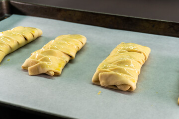 Puff pastry with chocolate and strawberries. Baking. Dessert. Dough.