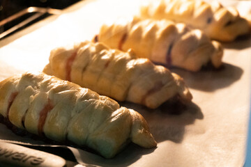 Puff pastry with chocolate and strawberries. Baking. Dessert. Dough.