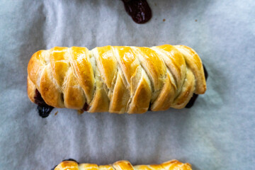 Puff pastry with chocolate and strawberries. Baking. Dessert. Dough.