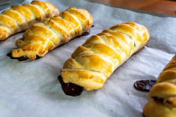 Puff pastry with chocolate and strawberries. Baking. Dessert. Dough.