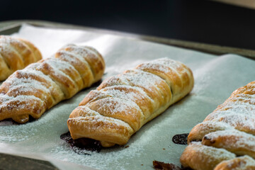 Puff pastry with chocolate and strawberries. Baking. Dessert. Dough.