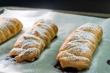 Puff pastry with chocolate and strawberries. Baking. Dessert. Dough.