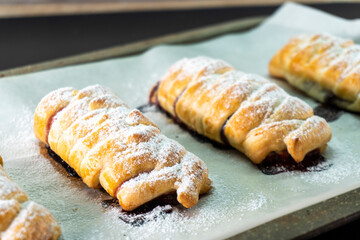 Puff pastry with chocolate and strawberries. Baking. Dessert. Dough.