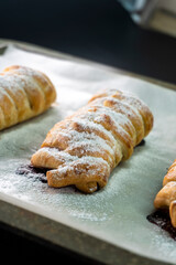 Puff pastry with chocolate and strawberries. Baking. Dessert. Dough.