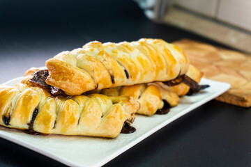 Puff pastry with chocolate and banana. Baking. Dessert. Dough.