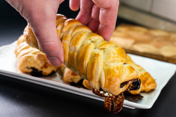 Puff pastry with chocolate and banana. Baking. Dessert. Dough.