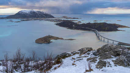 panoramic view over the islands of Sommarøy and Hillesøy with houses, bridge, rocks, meadows and...