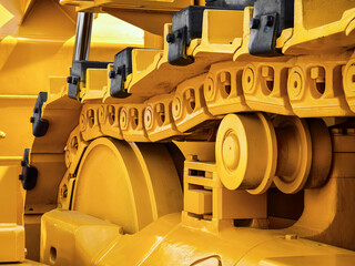 Excavator machinery showcasing intricate details of heavy-duty tracks and components for construction use