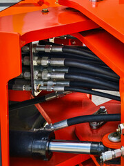 Detailed view of hydraulic system components in heavy machinery