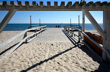 Sopot, Pomerania, Poland, Europe - peaceful sandy beach with Mini molo near entrance nr 5 to the beach and restaurant Koliba, Sopot Kamienny Potok, Park Północny, Gdańsk Bay, Baltic Sea, end of June