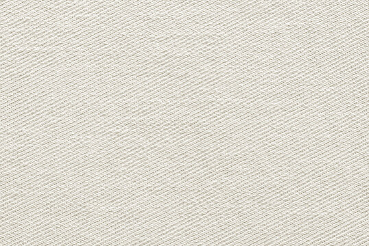 Beige cotton twill fabric pattern close up as background