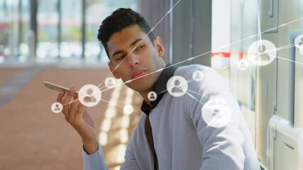 Man pressing phone to mouth on platform activating user-icons showing social network message - Powered by Adobe
