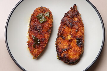 Indian fish fry, Basa or Pangasius, pan fried, marinated with spices