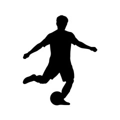 Soccer player silhouette kicking ball