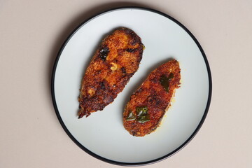 Indian fish fry, Basa or Pangasius, pan fried, marinated with spices