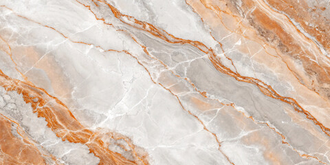 Fototapeta premium Light grey marble with subtle orange veining and white fractures creating gentle flowing patterns across smooth polished stone surface.