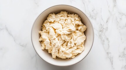 Freshly Made Butter in a Bowl on Elegant Marble Surface