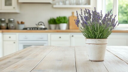 Small potted plant with purple flowers on a wooden table in a kitchen.