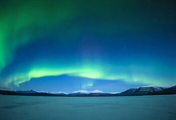 Stunning northern lights display illuminating a frozen lake and mountain range at night